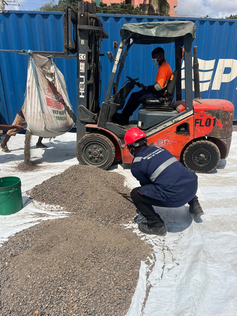 Field team conducting sampling and quality assurance on raw ore
